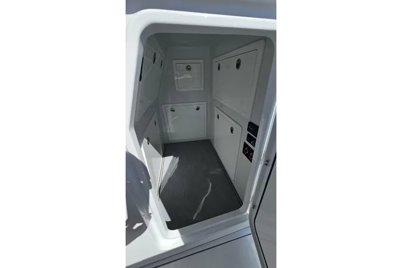  Yacht Photos Pics Interior view of 2025 Costa Custom Boats 34ST, featuring sleek storage compartments.