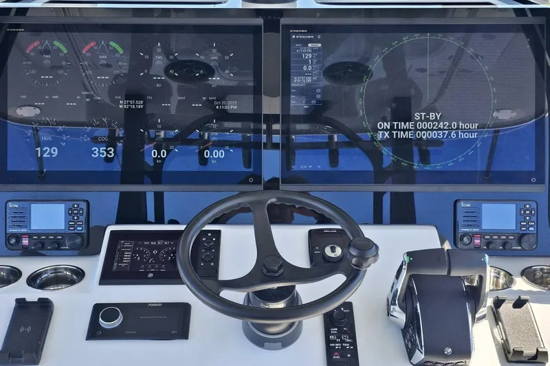  Yacht Photos Pics Cockpit of 2025 Costa Custom Boats 34ST with advanced navigation displays and controls.