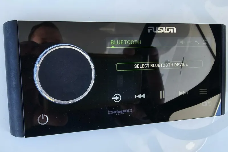  Yacht Photos Pics Fusion Bluetooth audio system on 2025 Costa Custom Boats 34ST, displaying device selection screen.