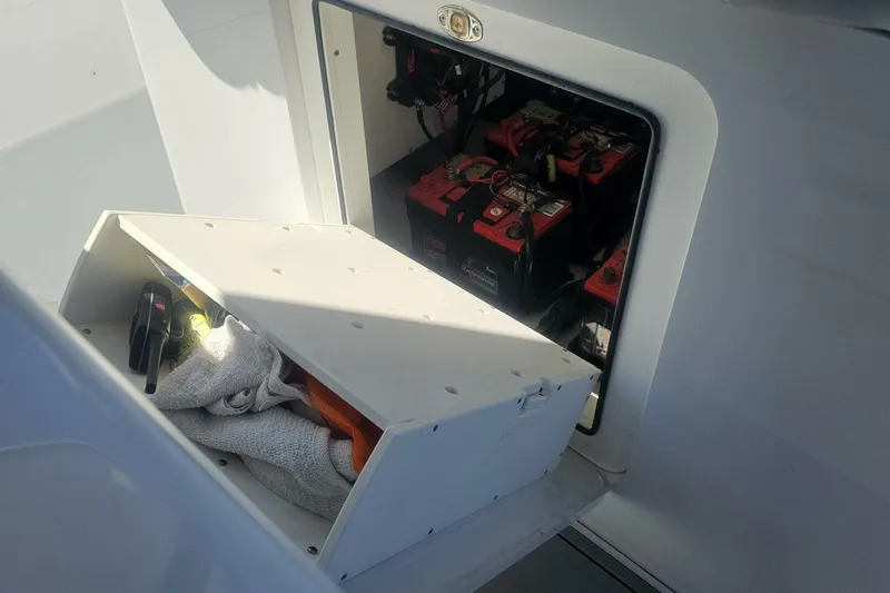  Yacht Photos Pics Storage compartment with tools and batteries on a 2025 Costa Custom Boats 34ST.