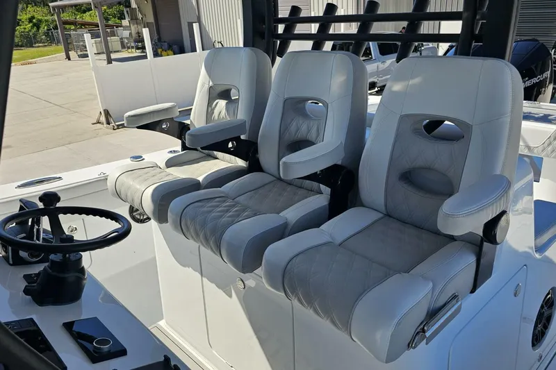  Yacht Photos Pics Luxury seating on 2025 Costa Custom Boats 34ST, featuring plush white upholstery and modern design.