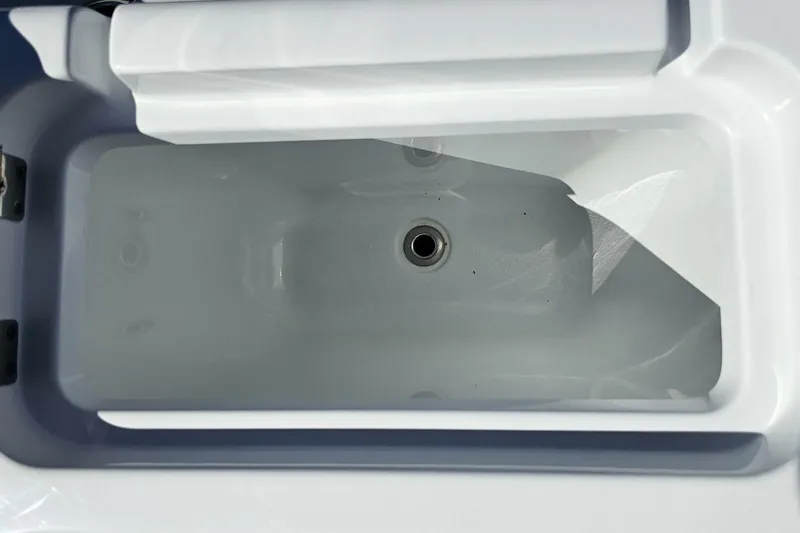  Yacht Photos Pics Livewell compartment of 2025 Costa Custom Boats 34ST, featuring a sleek, white interior design.