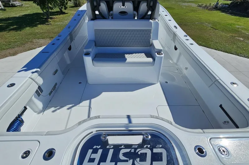  Yacht Photos Pics 2025 Costa Custom Boats 34ST interior, featuring spacious seating and sleek design.
