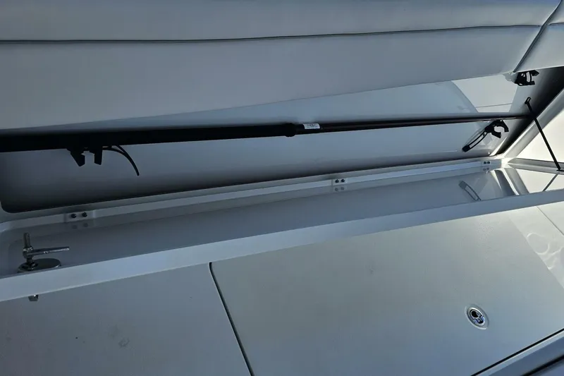  Yacht Photos Pics 2025 Costa Custom Boats 34ST storage compartment with hydraulic lift support.