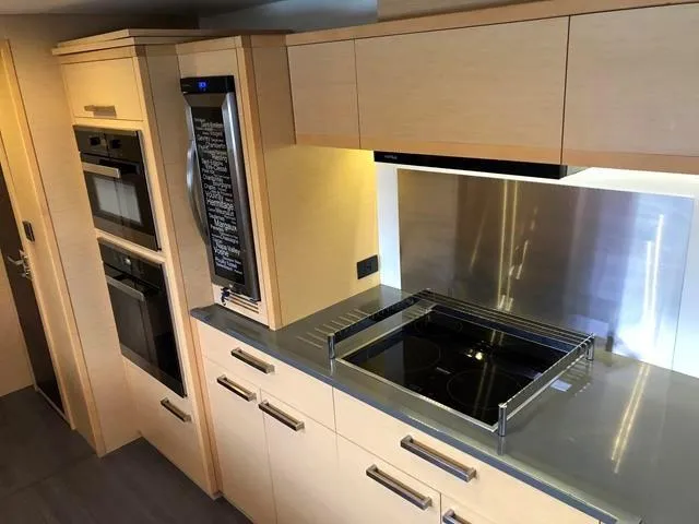  Yacht Photos Pics Modern kitchen in 2017 Lagoon 630 Motor Yacht with sleek appliances and cabinetry.