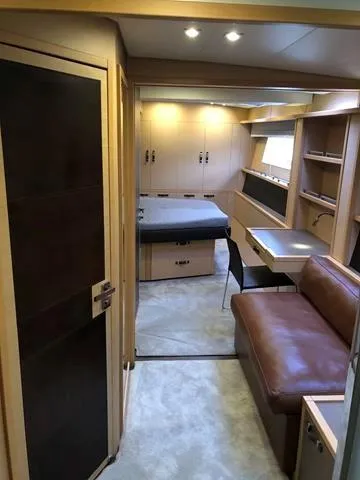  Yacht Photos Pics Interior of 2017 Lagoon 630 Motor Yacht with modern furnishings and cozy seating area.