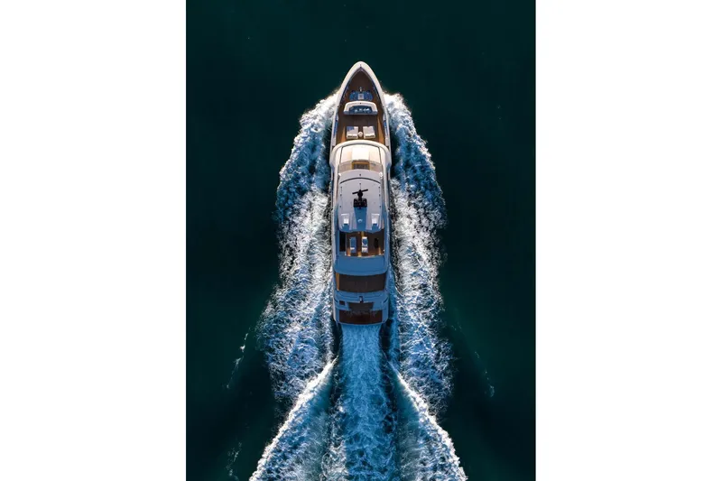 Stellamar Yacht Photos Pics Aerial view of 2023 Cantiere Delle Marche RJ 115 yacht cruising on open water.