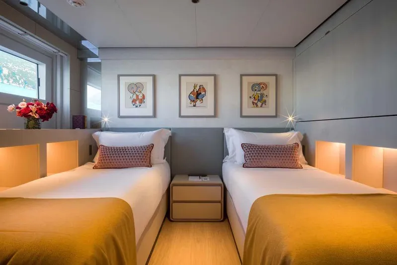 Stellamar Yacht Photos Pics Luxurious twin bedroom on 2023 Cantiere Delle Marche RJ 115 yacht, featuring modern decor.