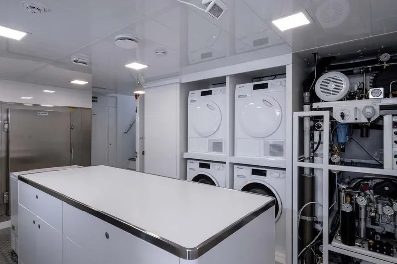 Stellamar Yacht Photos Pics Laundry room on 2023 Cantiere Delle Marche RJ 115 yacht with washers and dryers.