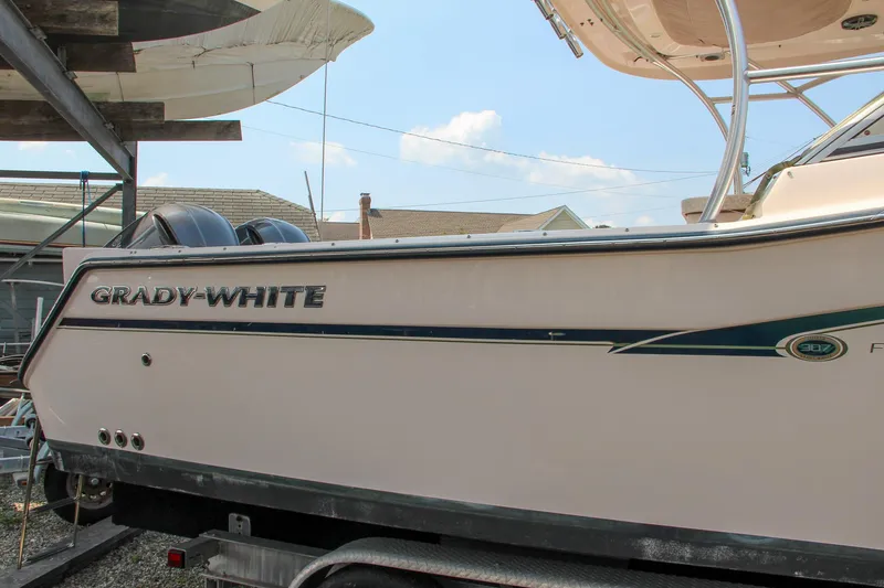 Marleon Yacht Photos Pics 2014 Grady-White Freedom 307 boat on trailer, side view.