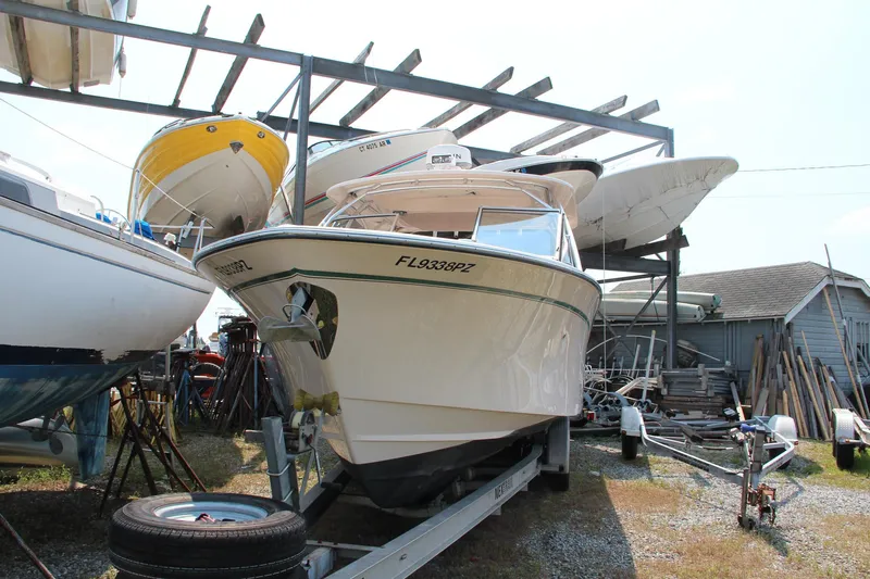 Marleon Yacht Photos Pics 2014 Grady-White Freedom 307 boat on trailer in storage yard.