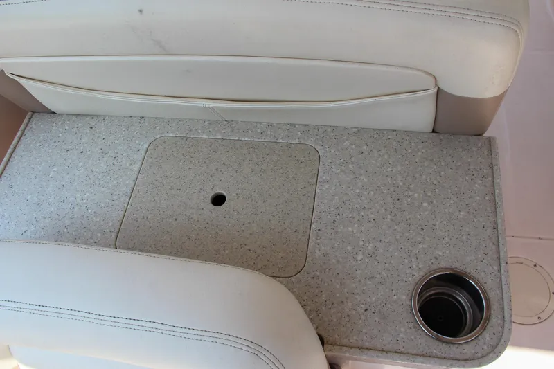 Marleon Yacht Photos Pics Grady-White Freedom 307 2014 boat interior with cup holder and seating.