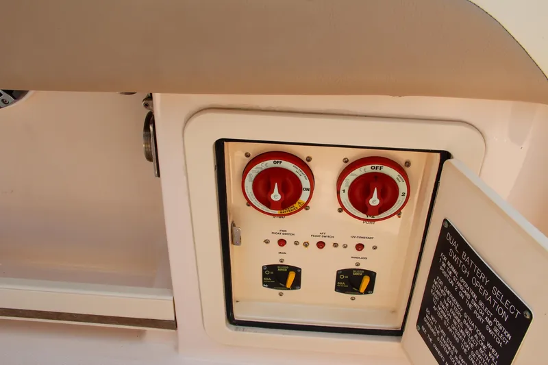 Marleon Yacht Photos Pics Control panel of a 2014 Grady-White Freedom 307 boat with switches and dials.