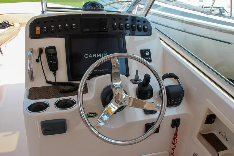 Marleon Yacht Photos Pics Grady-White Freedom 307 2014 boat dashboard with Garmin navigation system.