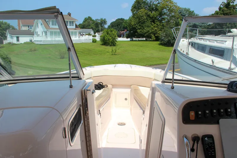 Marleon Yacht Photos Pics 2014 Grady-White Freedom 307 boat interior with open deck and scenic view.