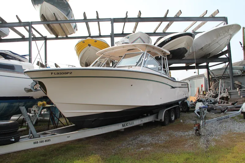 Marleon Yacht Photos Pics 2014 Grady-White Freedom 307 boat on trailer in storage facility.