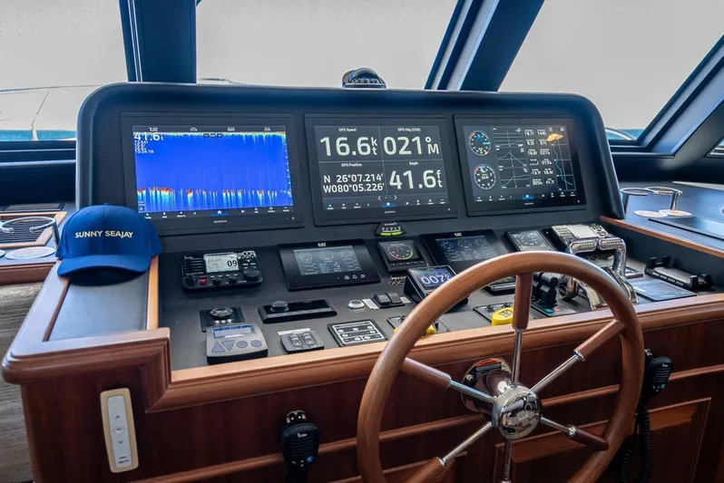 Sunny Seajay Yacht Photos Pics 2022 Hampton 658l Endurance yacht helm with advanced navigation displays and controls.