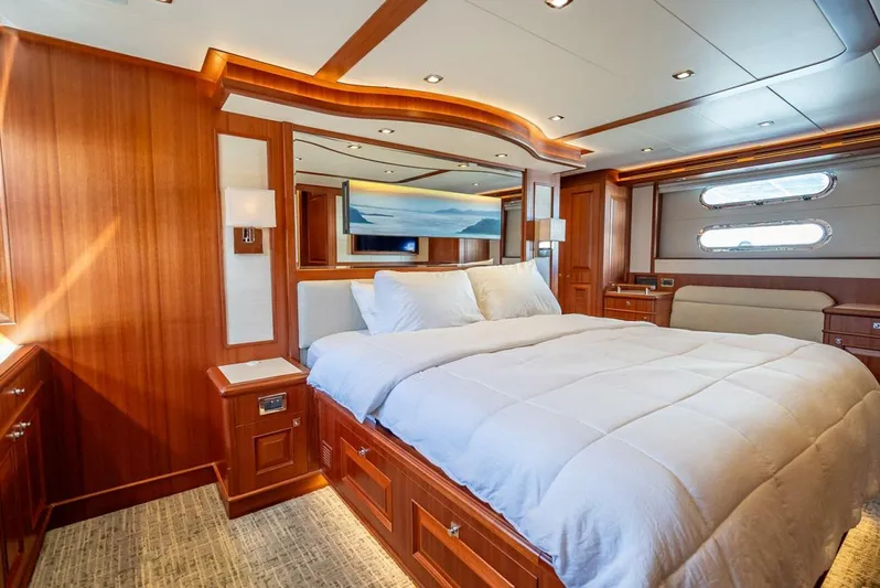 Sunny Seajay Yacht Photos Pics Luxurious bedroom in 2022 Hampton 658l Endurance yacht with elegant wood finishes.