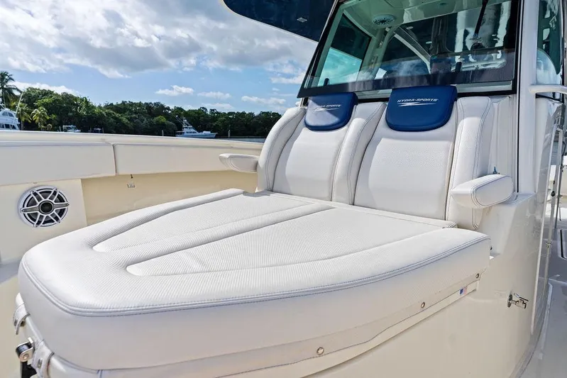 Acevedo Yacht Photos Pics Luxurious seating on 2016 Hydrosport Siesta boat under clear blue sky.