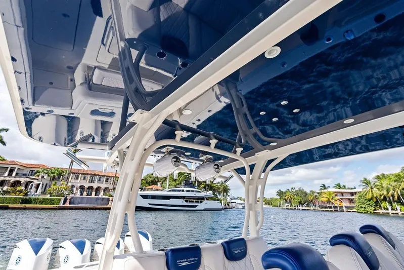 Acevedo Yacht Photos Pics 2016 Hydrosport Siesta boat interior with luxurious seating and waterfront view.