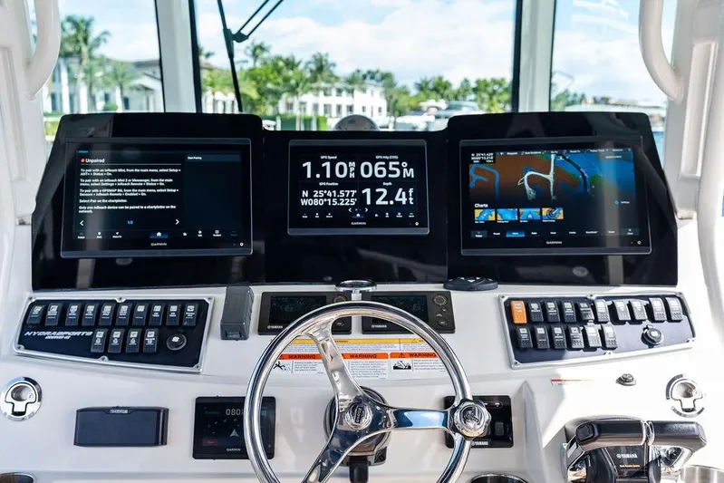 Acevedo Yacht Photos Pics Control panel of a 2016 Hydrosport Siesta boat with advanced navigation displays.