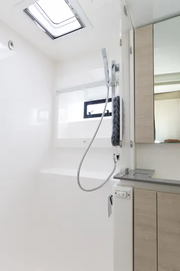  Yacht Photos Pics Modern bathroom interior in a 2021 Leopard 50 yacht, featuring sleek design and fixtures.