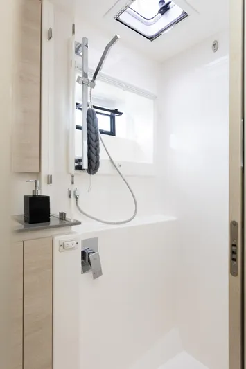  Yacht Photos Pics Modern shower area in 2021 Leopard 50 yacht, featuring sleek design and natural lighting.