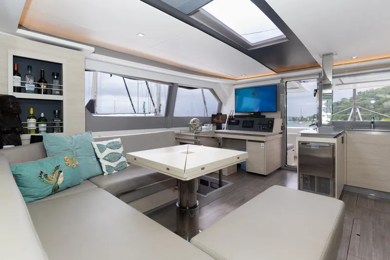  Yacht Photos Pics Luxurious interior of a 2021 Leopard 50 yacht with modern seating and navigation area.