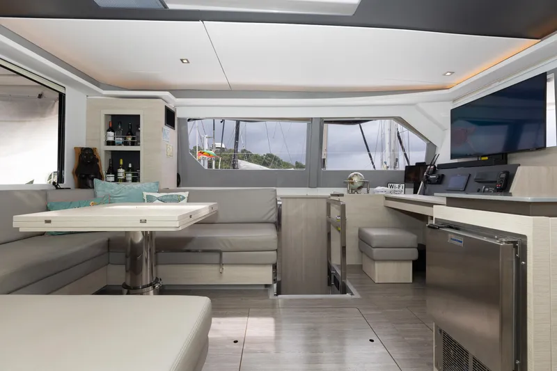  Yacht Photos Pics Luxurious interior of 2021 Leopard 50 yacht with modern seating and navigation area.
