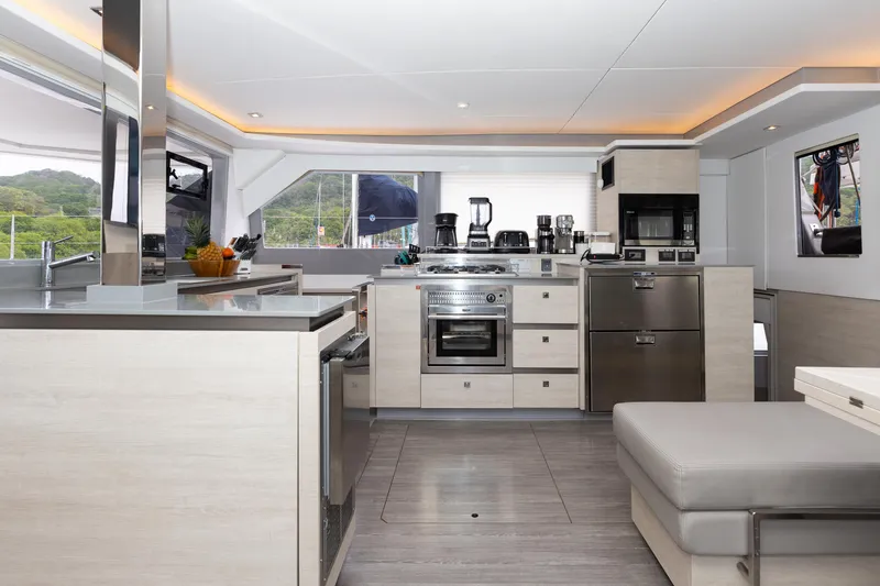  Yacht Photos Pics Modern kitchen interior on a 2021 Leopard 50 yacht, featuring sleek appliances and stylish design.