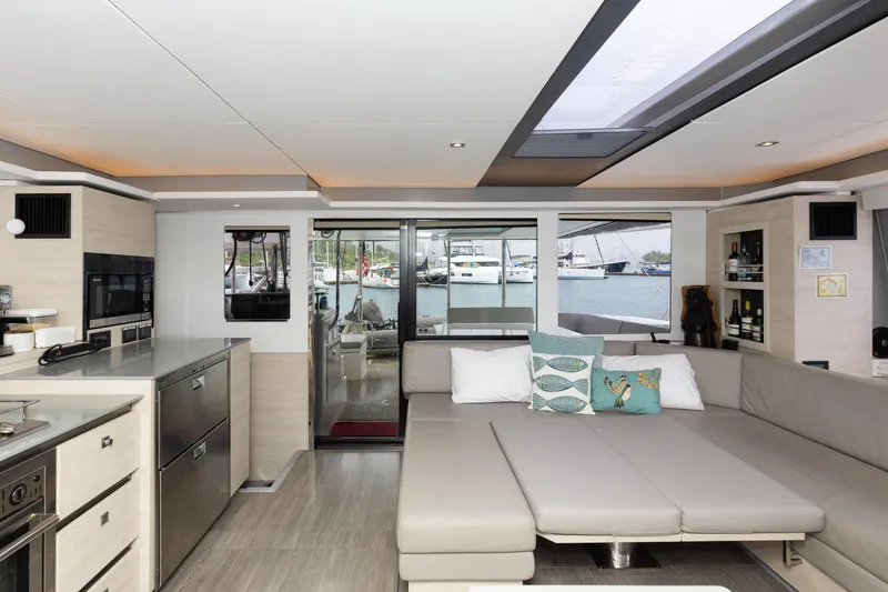  Yacht Photos Pics Luxurious interior of 2021 Leopard 50 yacht with modern kitchen and spacious seating area.