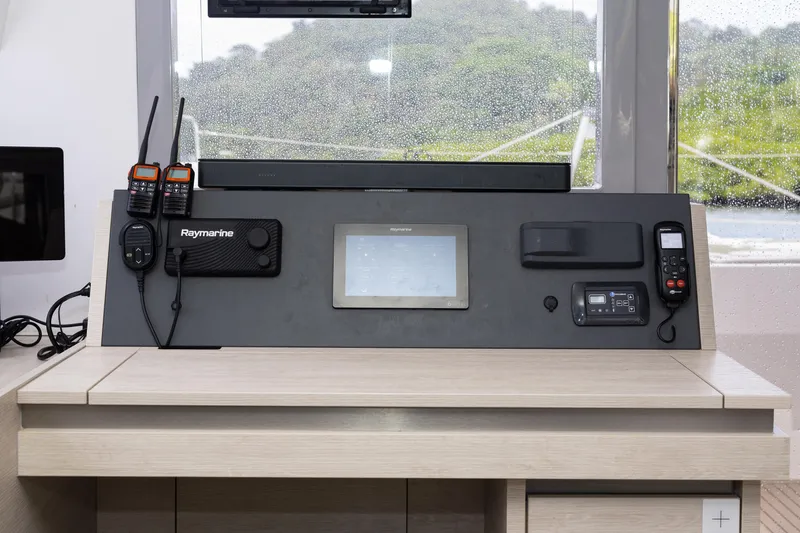  Yacht Photos Pics Control panel of a 2021 Leopard 50 yacht with navigation and communication equipment.
