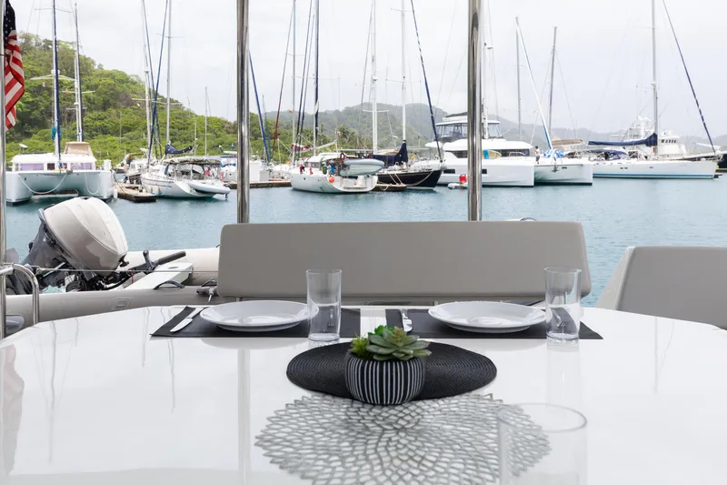  Yacht Photos Pics Luxury yacht dining area with marina view, Leopard 50 model, 2021.