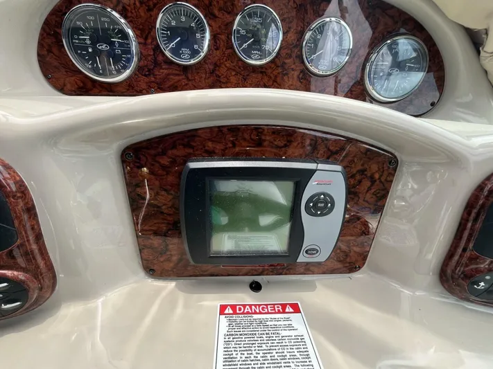  Yacht Photos Pics Dashboard of 2007 Sea Ray 340 Sundancer with gauges and navigation display.