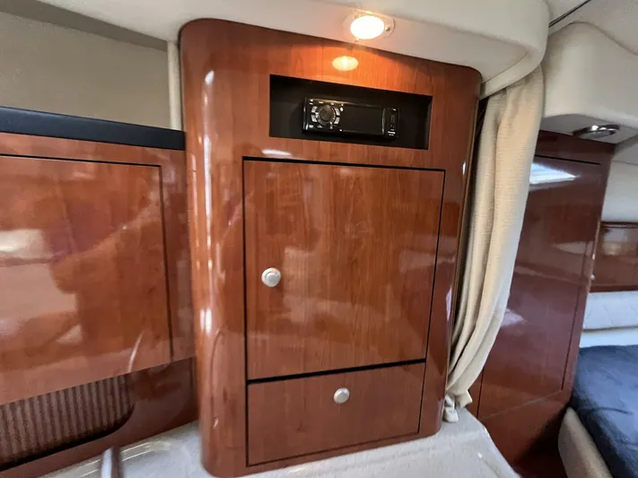  Yacht Photos Pics 2007 Sea Ray 340 Sundancer interior with polished wood cabinetry and ambient lighting.