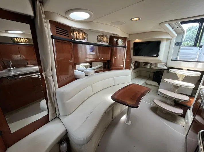  Yacht Photos Pics Luxurious interior of 2007 Sea Ray 340 Sundancer yacht with elegant seating and modern amenities.