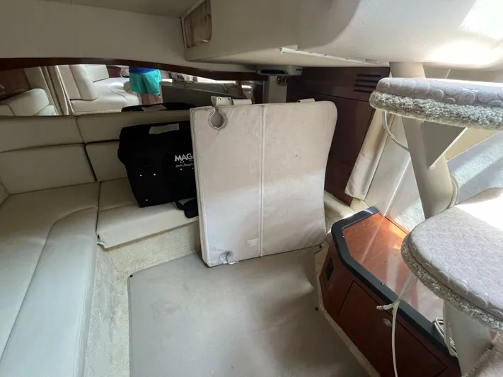  Yacht Photos Pics Interior of a 2007 Sea Ray 340 Sundancer boat with seating and storage.