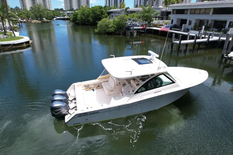 37 Grady White Freedom Yacht Photos Pics 2017 Grady-White Freedom 375 boat cruising in a scenic marina.