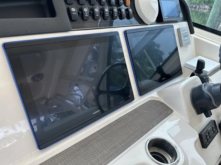 37 Grady White Freedom Yacht Photos Pics Control panel of 2017 Grady-White Freedom 375 boat with dual Garmin displays.