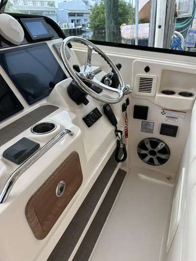 37 Grady White Freedom Yacht Photos Pics 2017 Grady-White Freedom 375 boat helm with steering wheel and control panel.