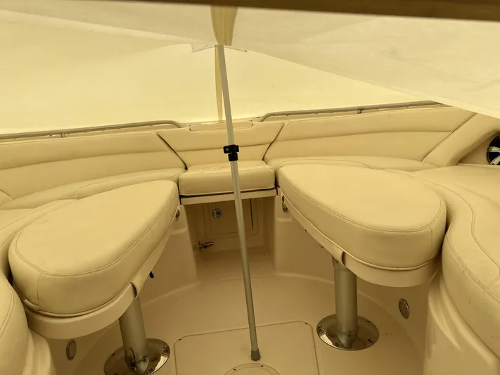 37 Grady White Freedom Yacht Photos Pics 2017 Grady-White Freedom 375 boat interior with beige seating and canopy.