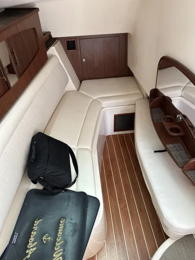37 Grady White Freedom Yacht Photos Pics 2017 Grady-White Freedom 375 cabin interior with seating and wooden flooring.