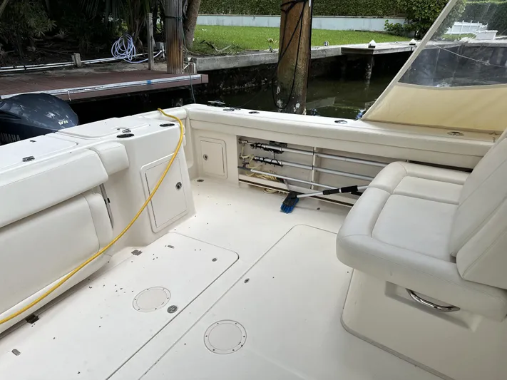 37 Grady White Freedom Yacht Photos Pics 2017 Grady-White Freedom 375 boat interior with seating and fishing rod storage.