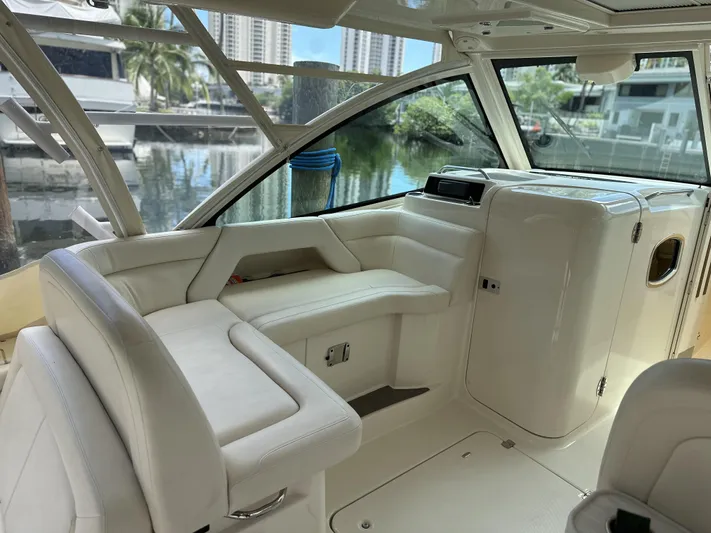 37 Grady White Freedom Yacht Photos Pics 2017 Grady-White Freedom 375 boat interior with white seating and modern design.