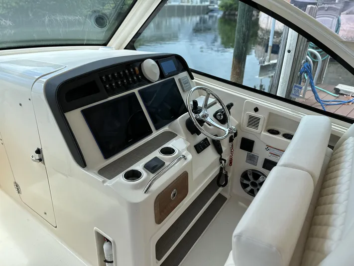 37 Grady White Freedom Yacht Photos Pics 2017 Grady-White Freedom 375 helm with dual screens and steering wheel.