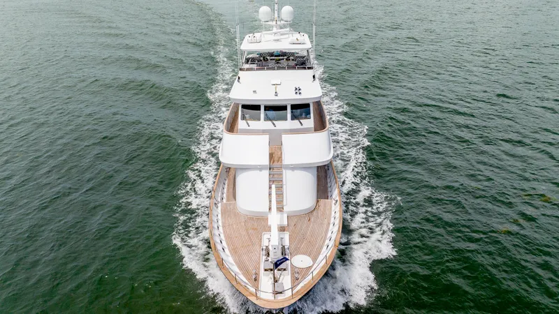 Bravo Yacht Photos Pics 1975 Stephens Brothers Expedition yacht cruising on open water, aerial view.