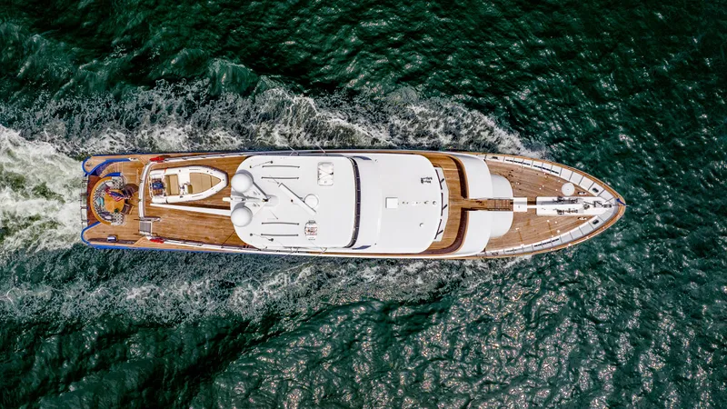 Bravo Yacht Photos Pics Aerial view of 1975 Stephens Brothers Expedition yacht cruising on the ocean.