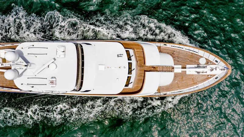 Bravo Yacht Photos Pics Aerial view of 1975 Stephens Brothers Expedition yacht cruising on the ocean.