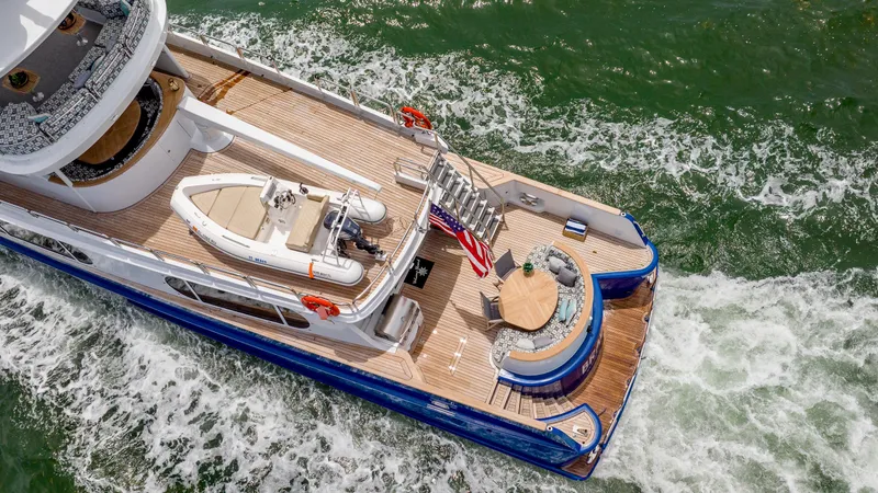 Bravo Yacht Photos Pics Aerial view of 1975 Stephens Brothers Expedition yacht cruising on water.