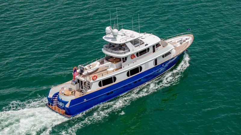 Bravo Yacht Photos Pics Aerial view of 1975 Stephens Brothers Expedition yacht cruising on the ocean.